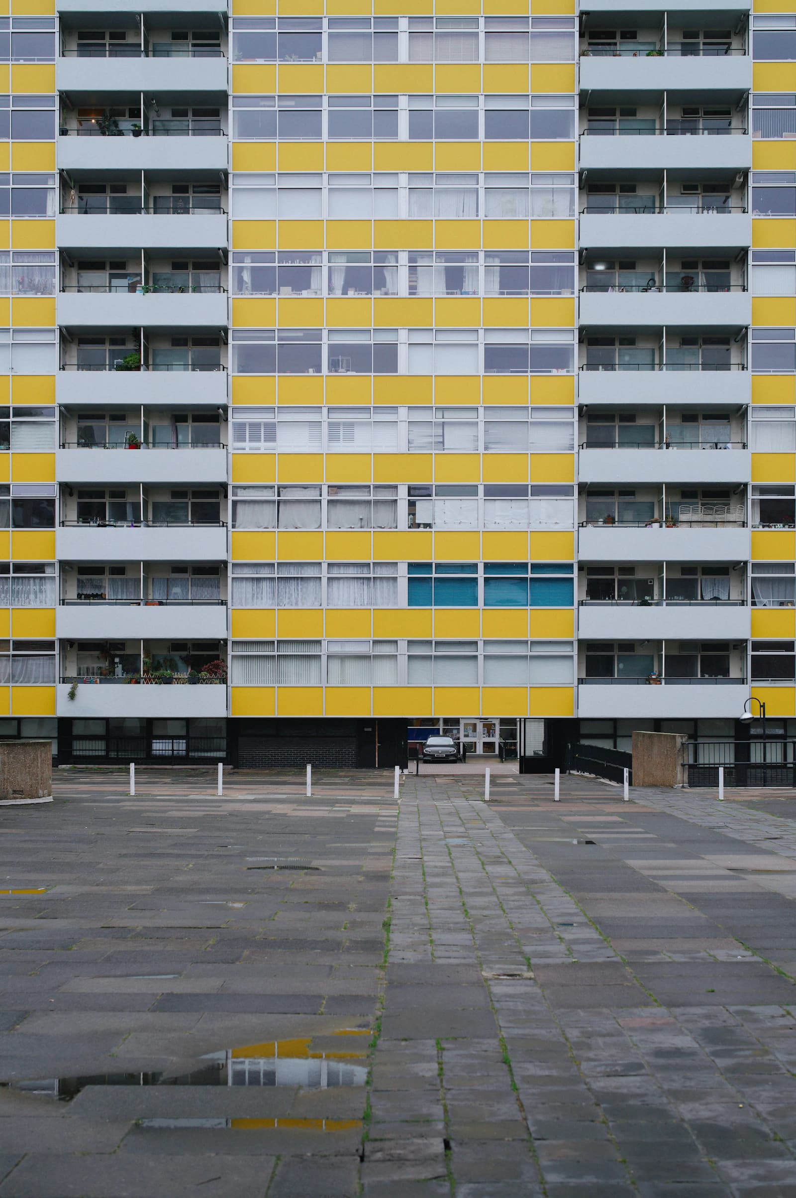 Yellow and white facade of a residential apartment building